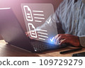 Businessman using laptop computer tick correct sign mark  109729279