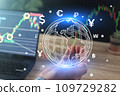 Global currency exchange concept, Businessman holding icon world 109729282