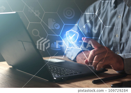 Businessman touching the icon of safety,Work safety concept. 109729284