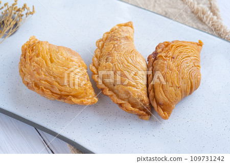 Close-up of Tortas de Guimaraes - pasty from Portugal Close-up of Tortas de Guimaraes - pasty from Portugal 109731242
