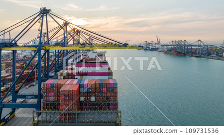 Aerial view container cargo ship at container cargo seaport terminal, Container cargo ship maritime freight shipping global business logistic import export worldwide international by container ship. 109731536