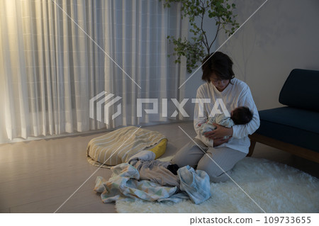 Mother's baby cries at night after one surgery Realistic image of postpartum, wide angle 109733655