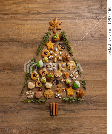 Christmas tree made of tasty cookies Christmas tree made of tasty cookies 109734693
