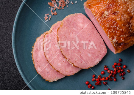 Delicious baked chicken or turkey meat roll with salt and spices Delicious baked chicken or turkey meat roll with salt and spices 109735845