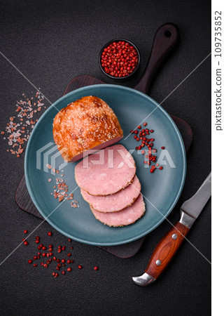 Delicious baked chicken or turkey meat roll with salt and spices Delicious baked chicken or turkey meat roll with salt and spices 109735852