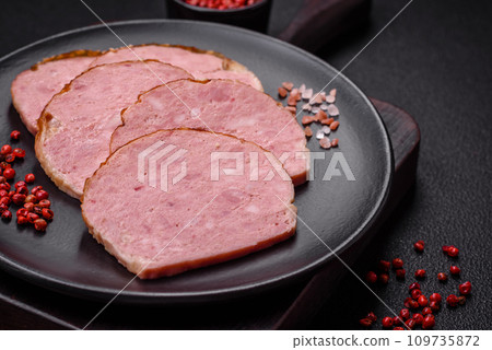 Delicious baked chicken or turkey meat roll with salt and spices Delicious baked chicken or turkey meat roll with salt and spices 109735872