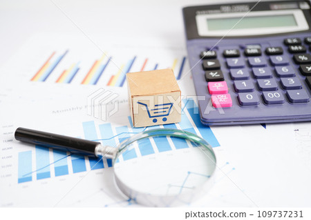 Calculator on chart graph paper. Finance, account, statistic, investment data economy, stock exchange business. 109737231