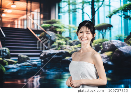 Young woman relaxing in a hot spring Young woman relaxing in a hot spring 109737853