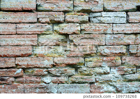 Grey Brick Wall with Cement Texture. Facade of the building Grey Brick Wall with Cement Texture. Facade of the building 109738268