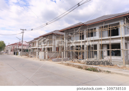 construction residential new house in progress at building site construction residential new house in progress at building site 109738510