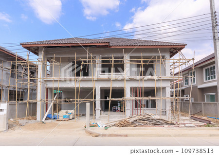 construction residential new house in progress at building site construction residential new house in progress at building site 109738513