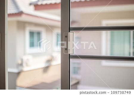 mosquito net wire screen on house window protection against insect 109738749