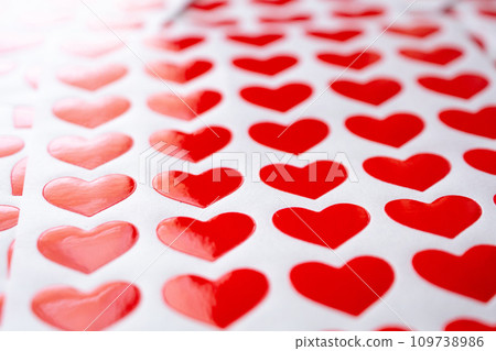 Close up red heart sticker on white paper 109738986