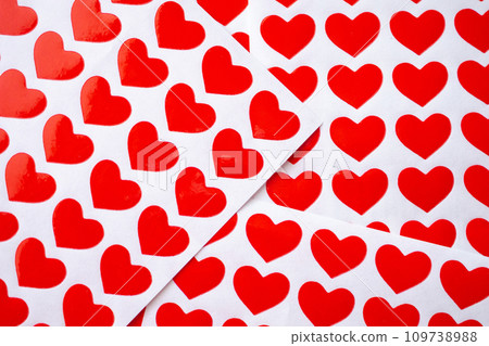 Close up red heart sticker on white paper 109738988