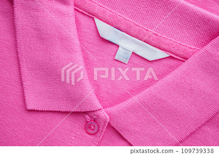 Blank white clothes label on new shirt Blank white clothes label on new shirt 109739338