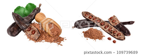 Carob pod and powder in wooden scoop isolated on white background with full depth of field. Carob pod and powder in wooden scoop isolated on white background with full depth of field. 109739689