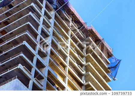 Construction of new skyscrapers on construction site of large American city Construction of new skyscrapers on construction site of large American city 109739733