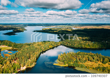 Aerial View Of Residential Area With Houses In Countryside. Top View Of Island From High Attitude In Autumn Morning. Bird's Eye View Of Old Lyepyel Cityscape Skyline Aerial View Of Residential Area With Houses In Countryside. Top View Of Island From High Attitude In Autumn Morning. Bird's Eye View Of Old Lyepyel Cityscape Skyline 109740307