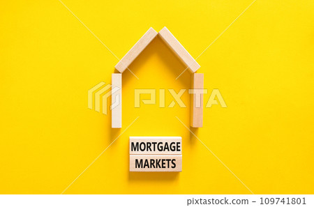 Mortgage markets symbol. Concept words Mortgage markets on beautiful wooden blocks. Beautiful yellow table yellow background. House model. Business mortgage markets concept. Copy space. Mortgage markets symbol. Concept words Mortgage markets on beautiful wooden blocks. Beautiful yellow table yellow background. House model. Business mortgage markets concept. Copy space. 109741801
