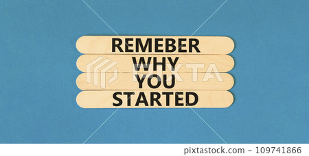Remember why you started symbol. Concept word Remember why you started on beautiful wooden stick. Beautiful blue table blue background. Business remember why you started concept. Copy space. 109741866