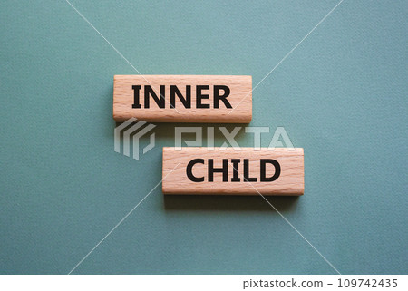 Inner Child symbol. Wooden blocks with words Inner Child. Beautiful grey green background. Business and Inner Child concept. Copy space. Inner Child symbol. Wooden blocks with words Inner Child. Beautiful grey green background. Business and Inner Child concept. Copy space. 109742435