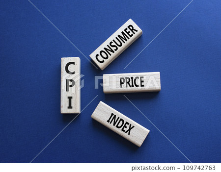 CPI - Consumer Price Index symbol. Concept word CPI on wooden blocks. Beautiful deep blue background. Business and CPI concept. Copy space. CPI - Consumer Price Index symbol. Concept word CPI on wooden blocks. Beautiful deep blue background. Business and CPI concept. Copy space. 109742763