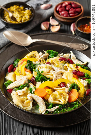 chicken minestrone soup with tortelloni in bowl 109742891