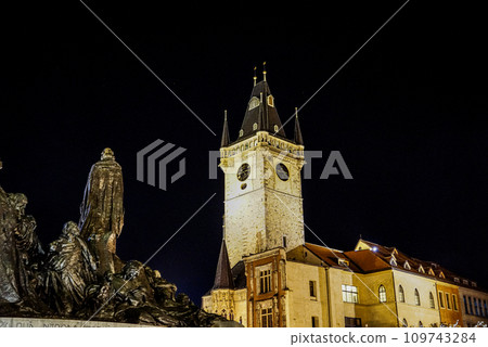 Illuminated statue of Jan Hus and church spire in Prague's Old Town Square Illuminated statue of Jan Hus and church spire in Prague's Old Town Square 109743284