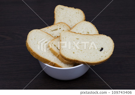sliced bread on a white plate 109743406