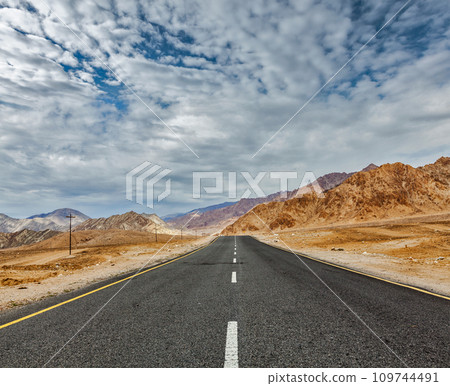 Road in Himalayas with mountains 109744491