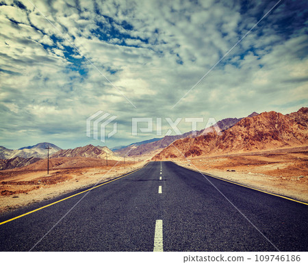 Road in Himalayas with mountains Road in Himalayas with mountains 109746186