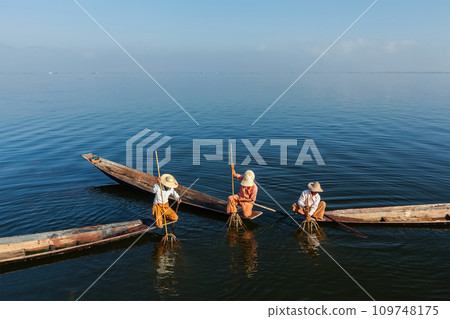 Burmese fisherman at Inle lake, Myanmar Burmese fisherman at Inle lake, Myanmar 109748175