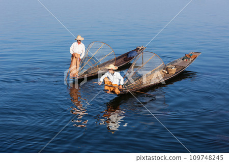Traditional Burmese fishermen at lake, Myanmar Traditional Burmese fishermen at lake, Myanmar 109748245