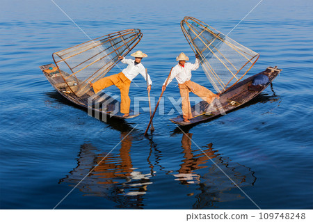 Burmese fishermen at Inle lake, Myanmar Burmese fishermen at Inle lake, Myanmar 109748248