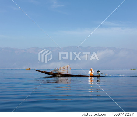 Traditional Burmese fisherman in Myanmar 109748257