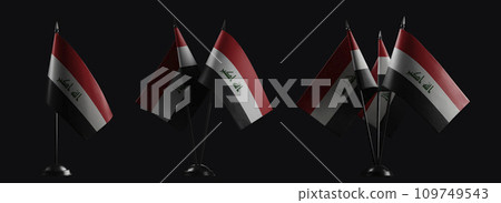 Small national flags of the Iraq on a black background 109749543