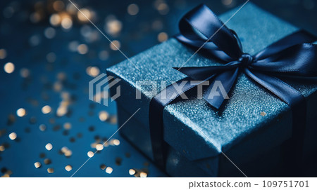 AI-generated content. Gift box on dark blue background. Elegant present for Christmas, birthday, Fathers Day 109751701