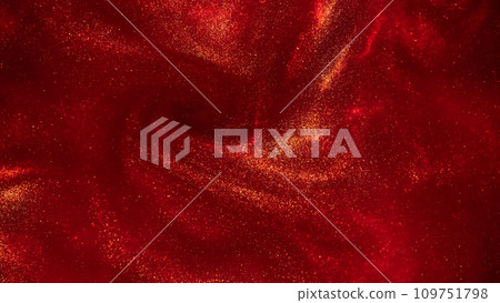 Swirls of Gold Dust Particles in Red Liquid. Magical waves of golden glittering particles in various hues of red with a depth of field. Abstract shiny background. Swirls of Gold Dust Particles in Red Liquid. Magical waves of golden glittering particles in various hues of red with a depth of field. Abstract shiny background. 109751798