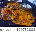 traditional indian pancake with butter 109751888