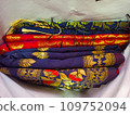 colorful silk fabrics for sale on a market 109752094