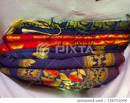 colorful silk fabrics for sale on a market 109752094