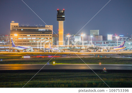 Itami Airport tarmac from Itami Sky Park at night 109753396