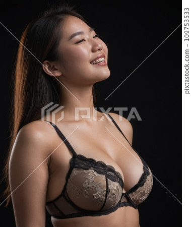 beautiful asian woman wearing lingerie on black background beautiful asian woman wearing lingerie on black background 109753533