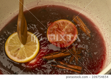 Mulled wine red wine vinchot pot cooking scene Mulled wine red wine vinchot pot cooking scene 109754654