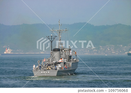 Minesweeper of the Japan Maritime Self-Defense Force leaving port 109756068