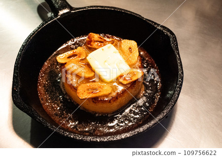 Radish steak grilled in a skillet 109756622
