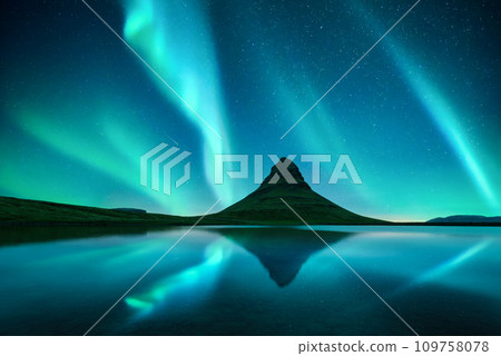 Reflection of Kirkjufell mountain and Northern lights Reflection of Kirkjufell mountain and Northern lights 109758078