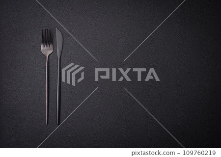 Kitchen knife and fork made of steel with copy space 109760219