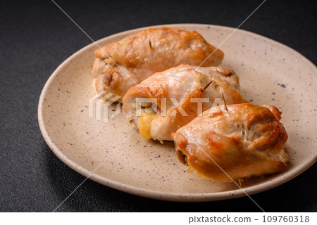 Delicious fresh meat roll made from chicken fillet, mushrooms, spices and herbs 109760318