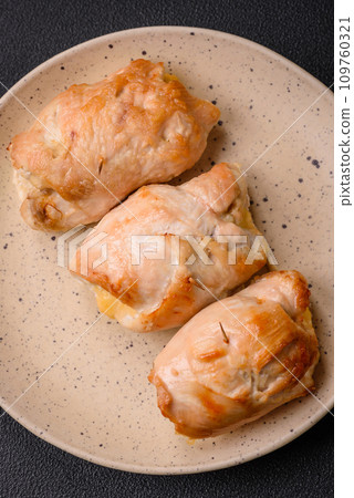 Delicious fresh meat roll made from chicken fillet, mushrooms, spices and herbs Delicious fresh meat roll made from chicken fillet, mushrooms, spices and herbs 109760321